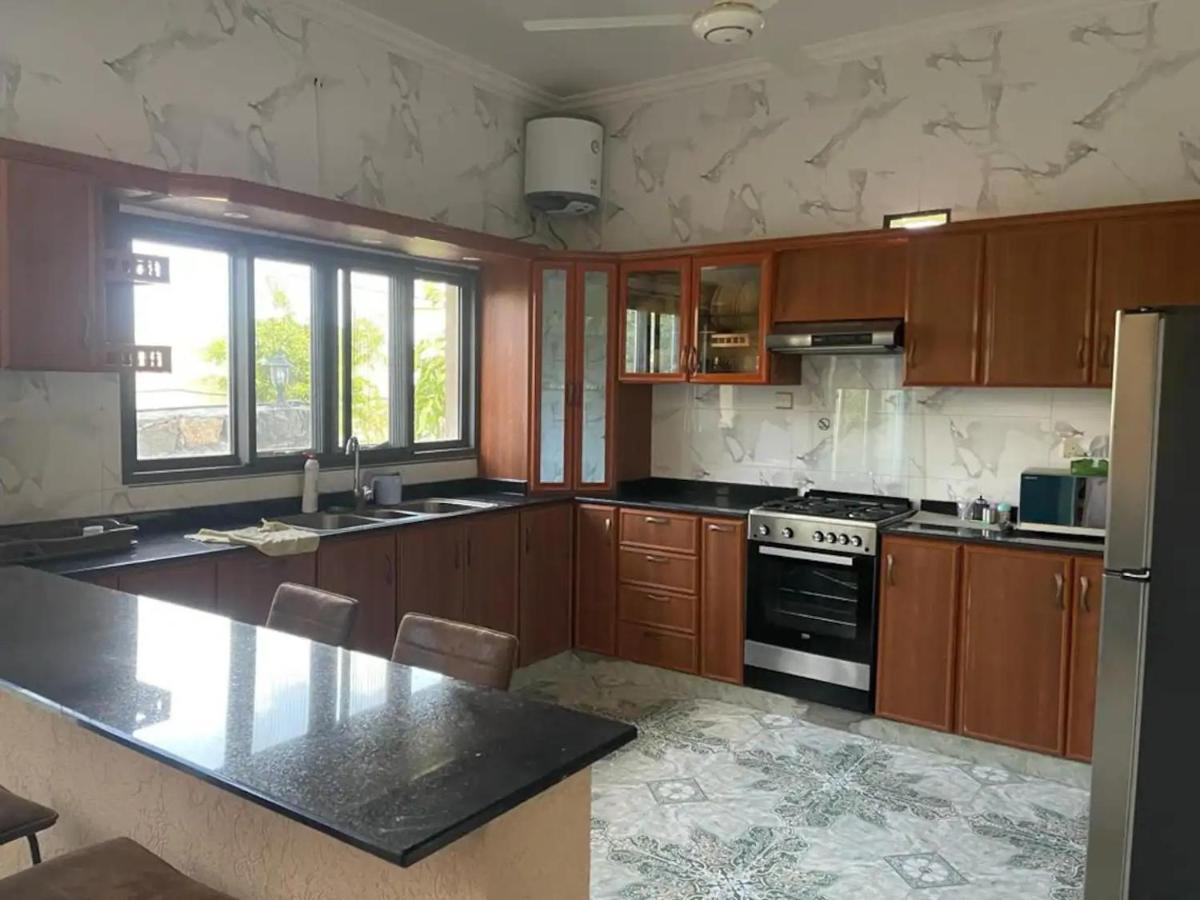 Rose Guesthouse Al 'Aqar Dış mekan fotoğraf