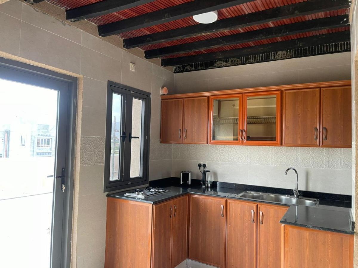 Rose Guesthouse Al 'Aqar Dış mekan fotoğraf