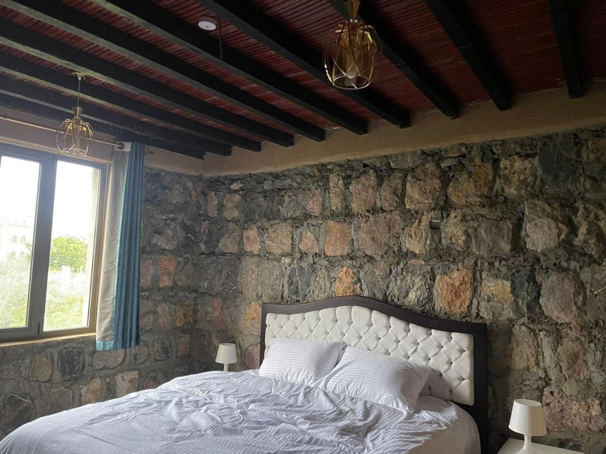 Rose Guesthouse Al 'Aqar Dış mekan fotoğraf